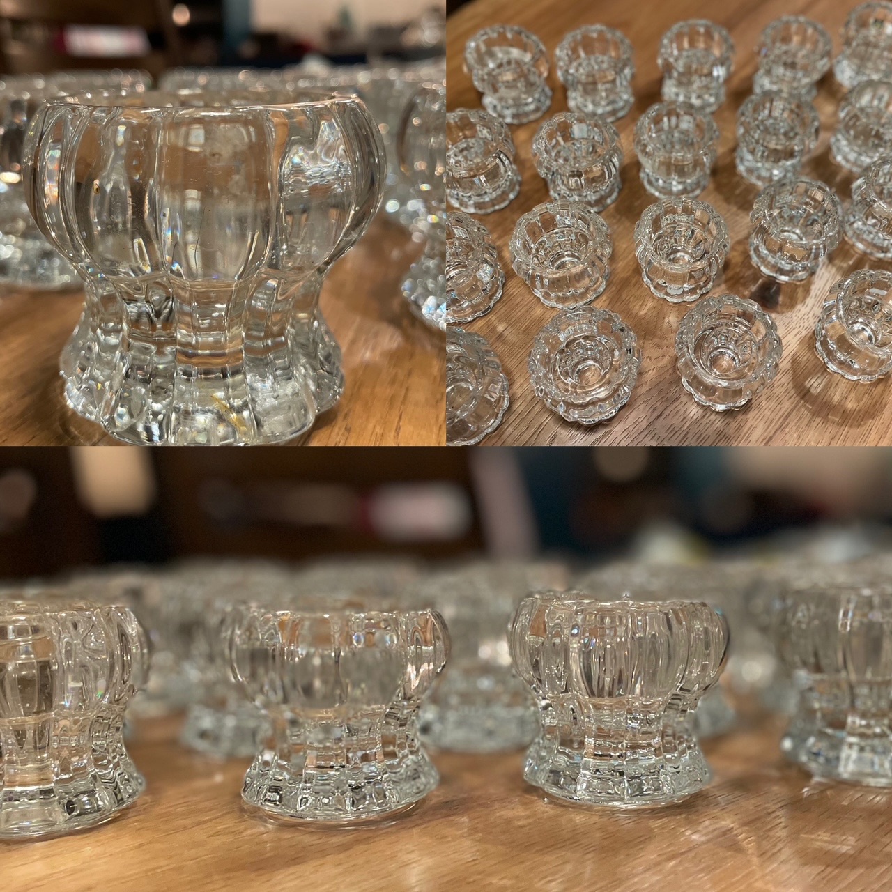 Rows of small pressed-glass votive holders gathered on a wooden table.